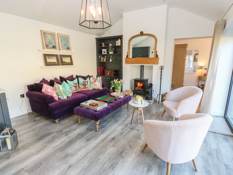 Living room view with sofa and chairs